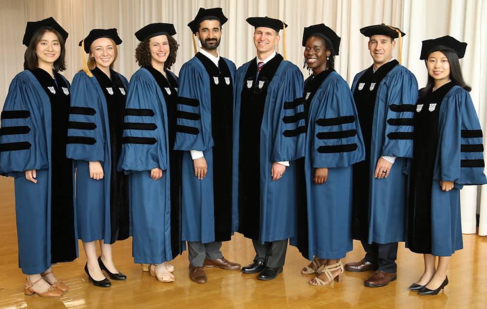 Several people in caps and gowns