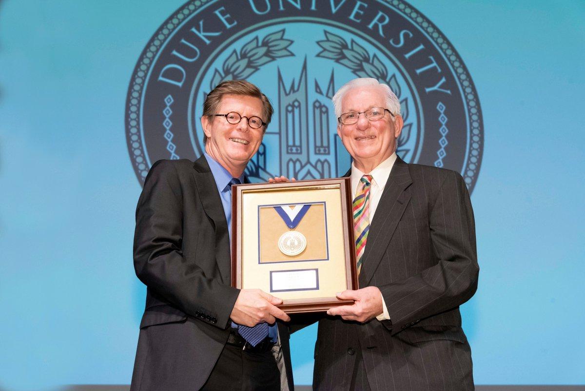 President Price presenting Professor Tony Brown with the Duke Presidential Award